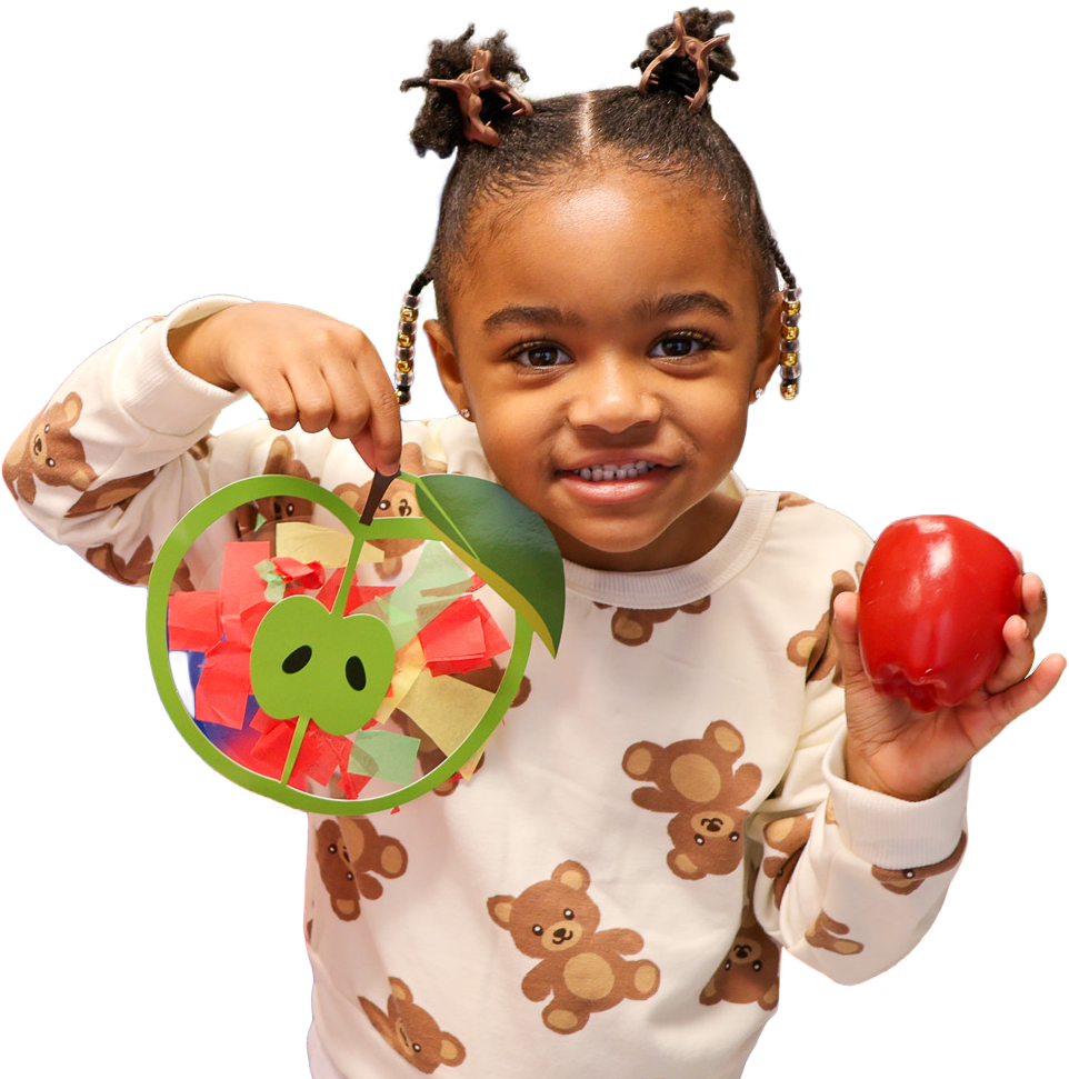 girl holding apple