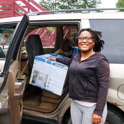 Tayia receives an air conditioner and two fans to help keep her home cool.  