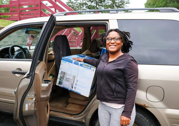 Tayia receives an air conditioner and two fans to help keep her home cool.  
